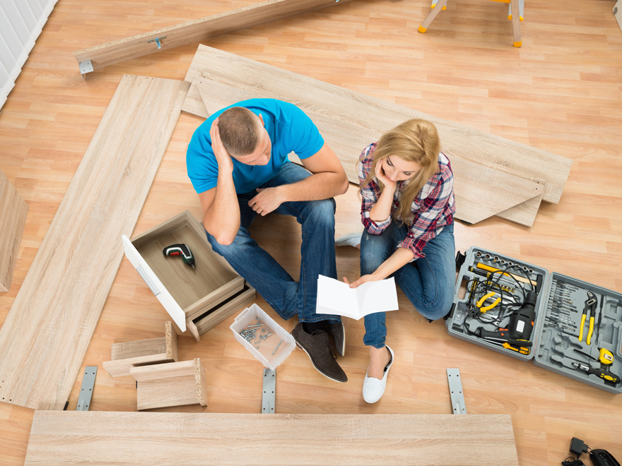 couple putting together funiture